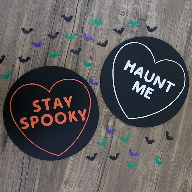 Two wooden plaques I bought from Sinister Signs